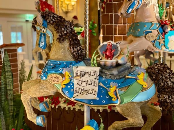 gingerbread little mermaid carousel display at disney's beach club resort