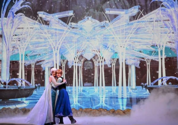 Anna and Elsa hugging at Frozen Sing-Along
